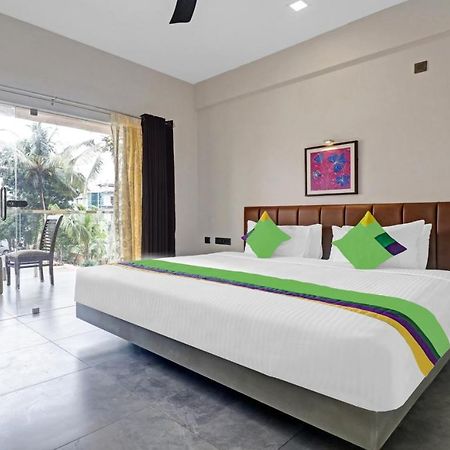 Treebo Grand Vistara Airport Suites Kochi Kültér fotó