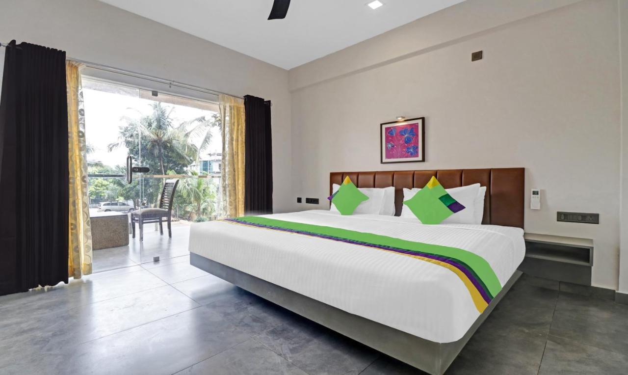 Treebo Grand Vistara Airport Suites Kochi Kültér fotó
