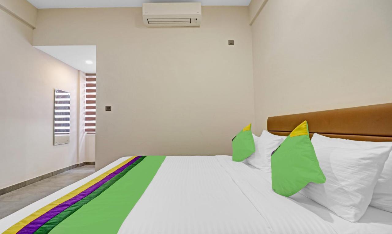 Treebo Grand Vistara Airport Suites Kochi Kültér fotó