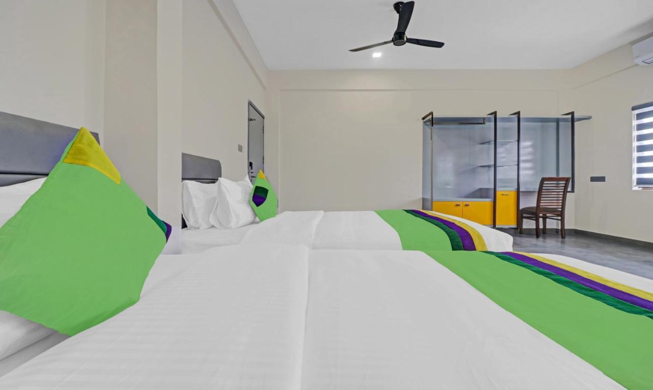 Treebo Grand Vistara Airport Suites Kochi Kültér fotó