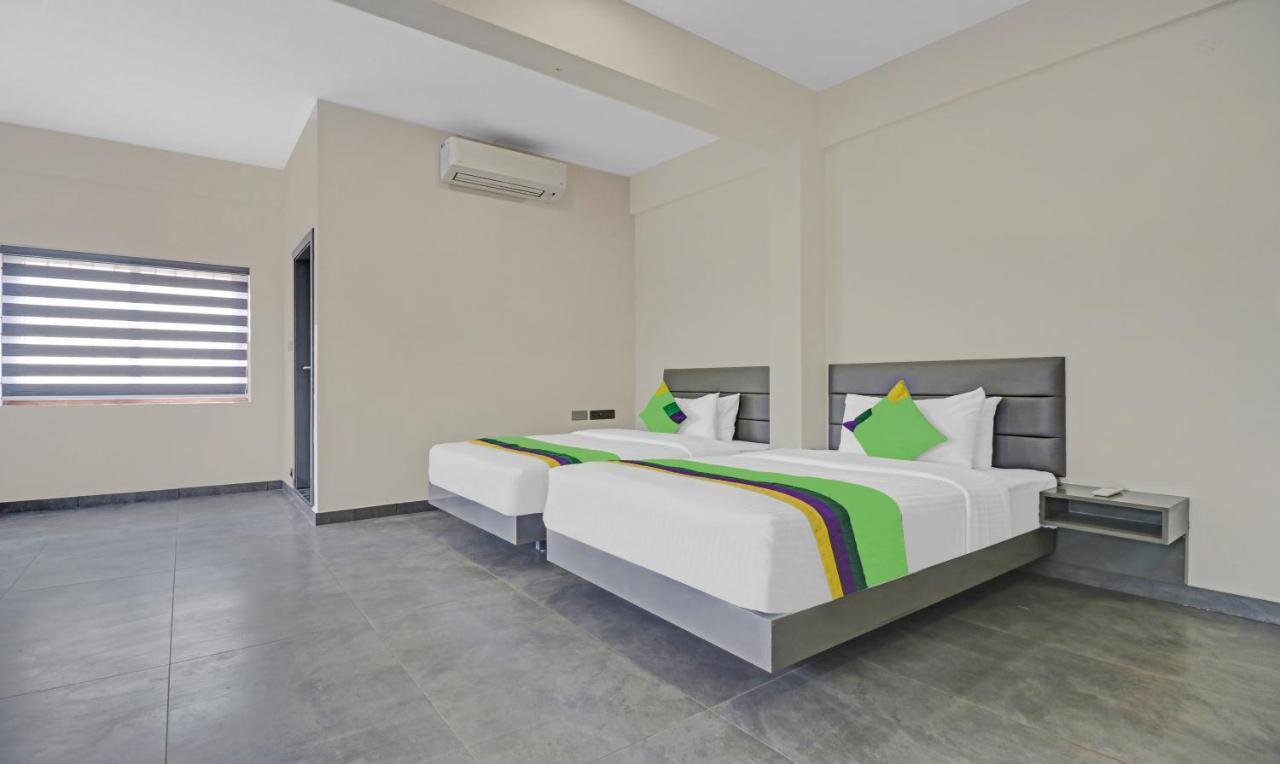 Treebo Grand Vistara Airport Suites Kochi Kültér fotó